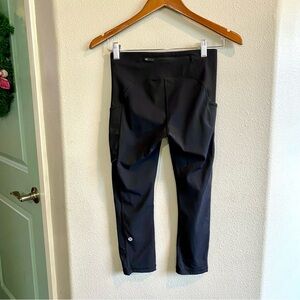 Lululemon Women’s size 4 Speed Up Crop Leggings 21" Black Pockets Luxtreme